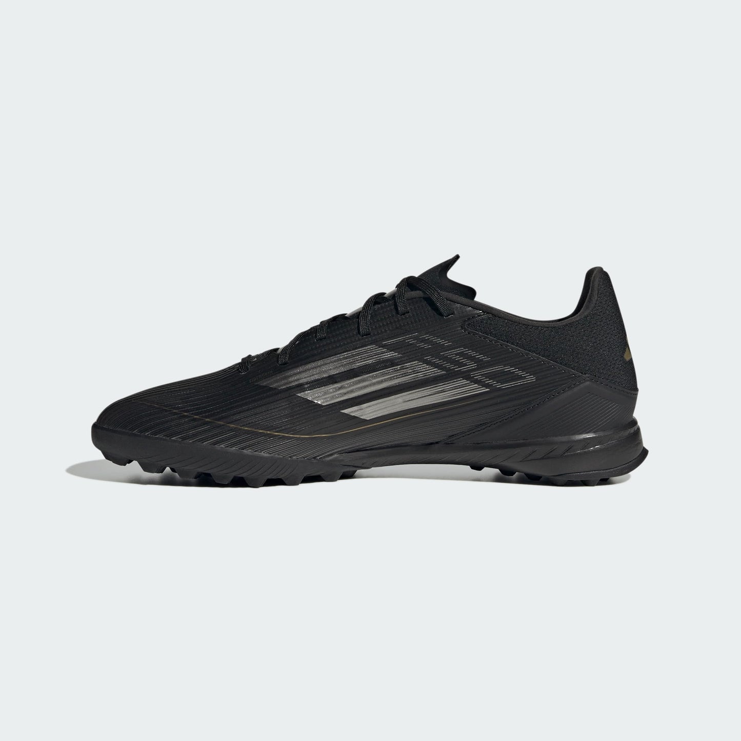 adidas Unisex F50 League Turf Sneaker, Black/Iron Metallic/Gold Metallic, 10 US Men