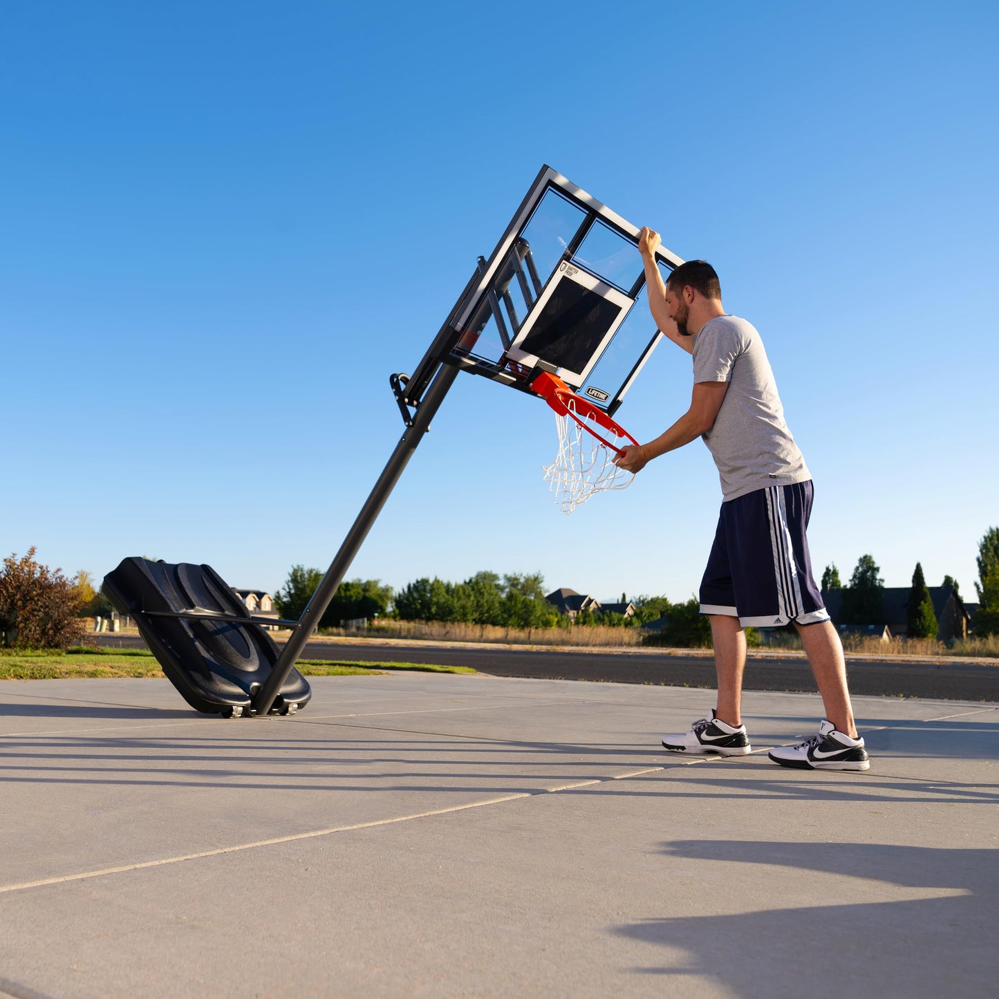 Lifetime Adjustable Portable Basketball Hoop, 54-Inch Steel-Framed Polycarbonate Backboard