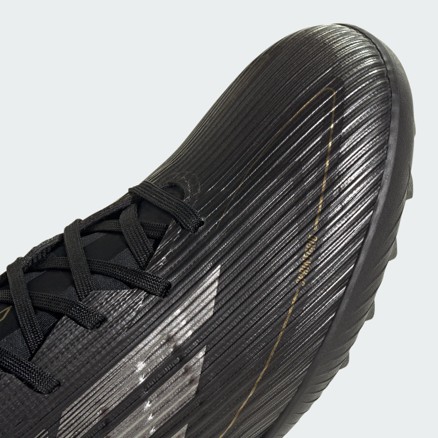 adidas Unisex F50 League Turf Sneaker, Black/Iron Metallic/Gold Metallic, 10 US Men