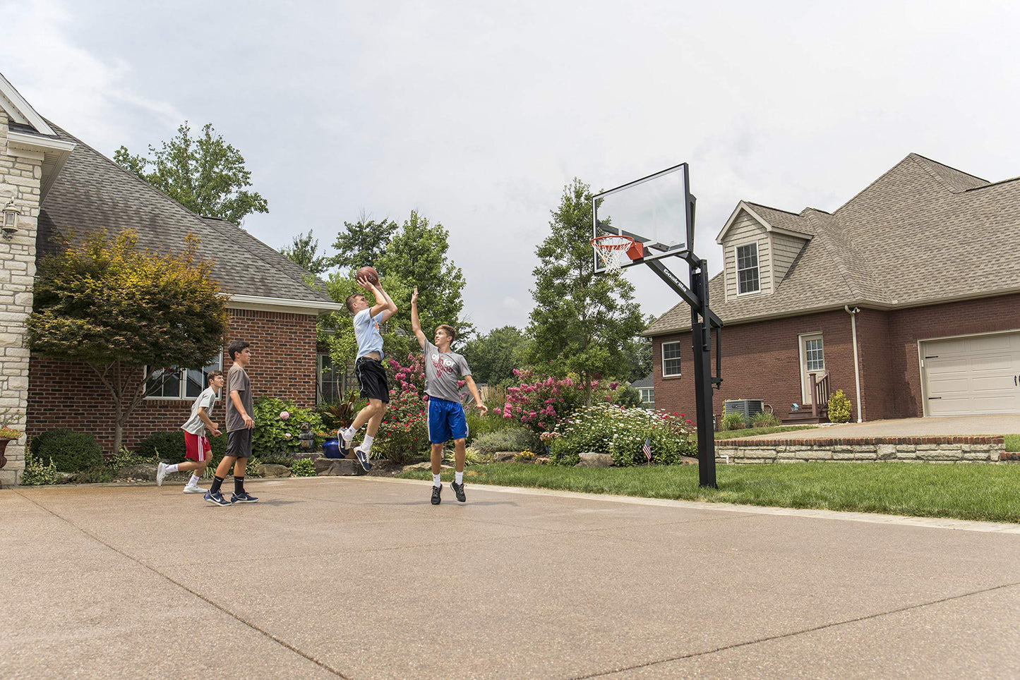 Goalrilla Basketball Hoops with Tempered Glass Basketball Goal Backboard, Black Anodized Frame, and In-ground Anchor System